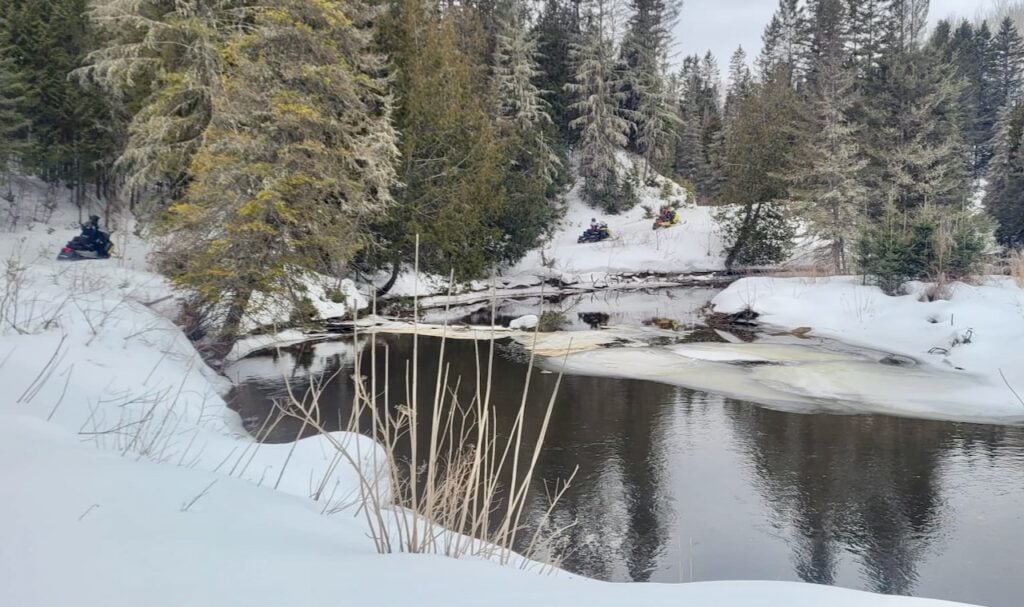 Abitibi-Témiscamingue snowmobile trail along a river